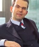 naumer Hans-Jörg Naumer, AGI