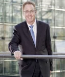 Christian Kühni, Wealth Cap