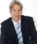 Oliver Bruess, Central Oliver Brüß, Domcura