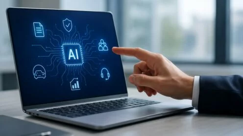 Laptop auf dessen Monitor das AI-Symbol zu sehen ist