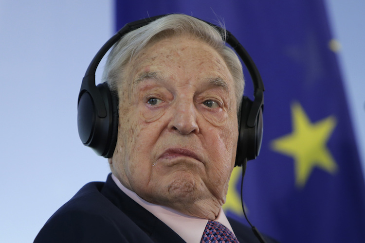 Hungarian-American investor George Soros attends a press conference prior to the launch event for the European Roma Institute for Arts and Culture at the Foreign Ministry in Berlin, Germany, Thursday, June 8, 2017. (AP Photo/Ferdinand Ostrop) |