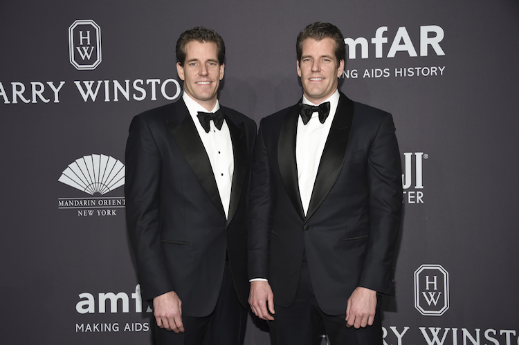 Cameron Winklevoss, left, and Tyler Winklevoss attend amfAR's Fashion Week New York Gala at Cipriani Wall Street on Wednesday, Feb. 8, 2017, in New York. (Photo by Evan Agostini/Invision/AP) |