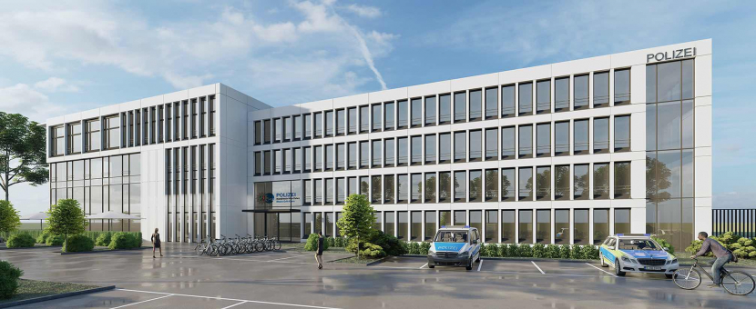Zwei Polizeitautos vor dem vierstöckigen Gebäude, das Warbug-HIH erwirbt