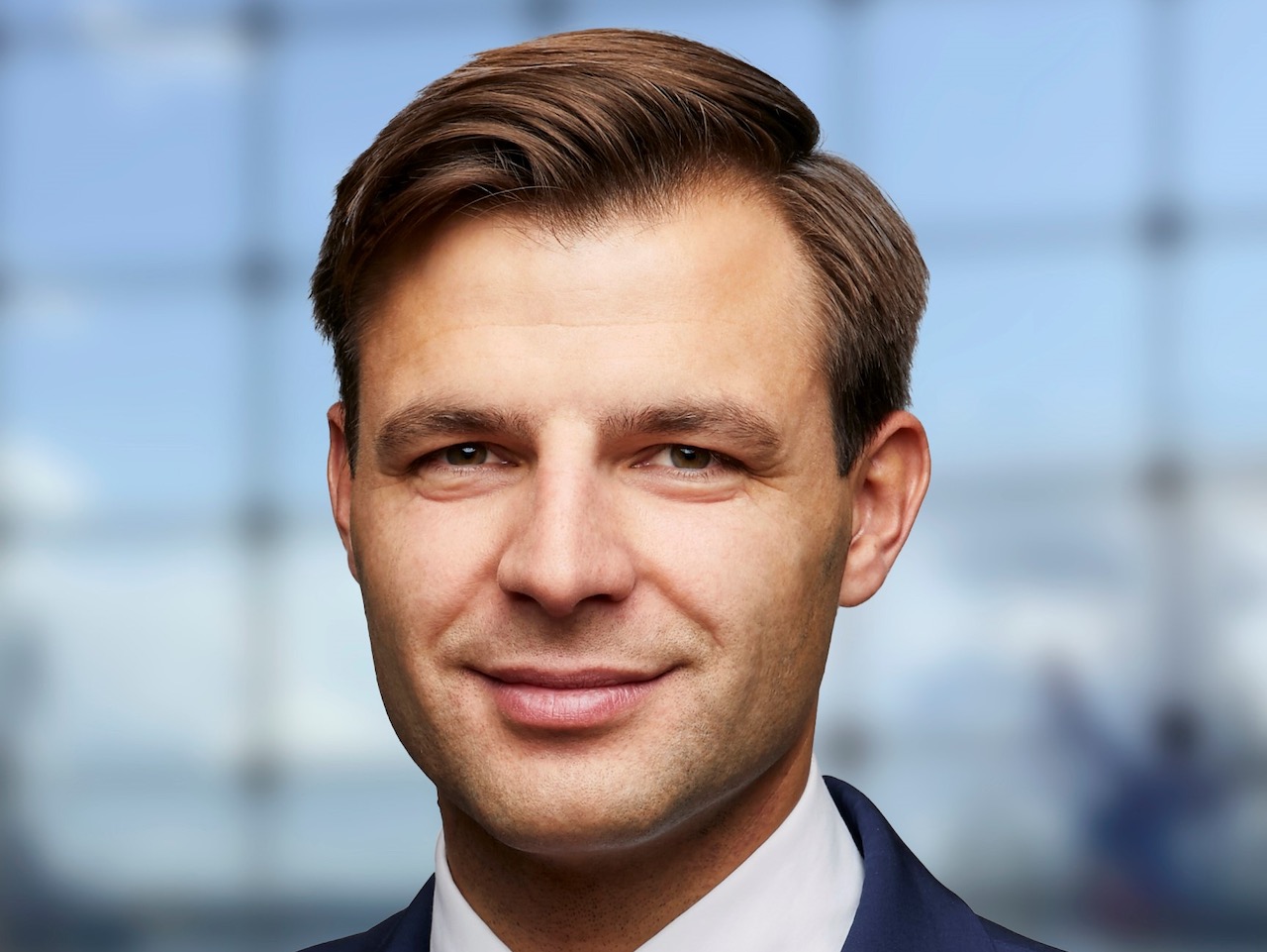 Porträtfoto von Tomasz Kalemba, Engel & Völkers Capital 