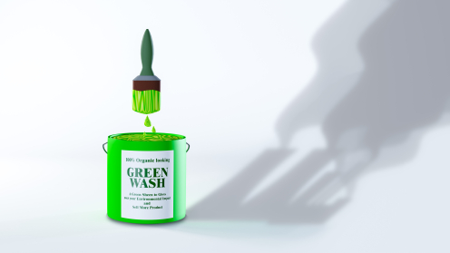 Ein Eimer mit grüner Farbe auf dem Green Wash steht
