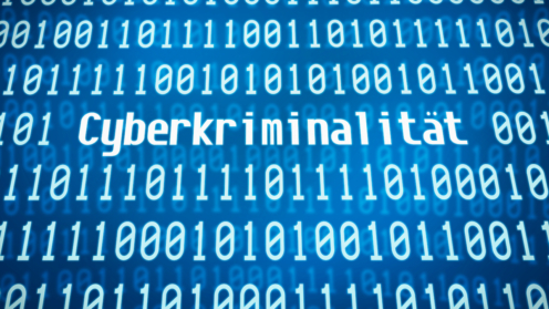 Binärcode mit dem Wort Cyberkriminalität