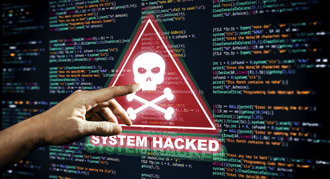 Symbol "System hacked" auf Monitor