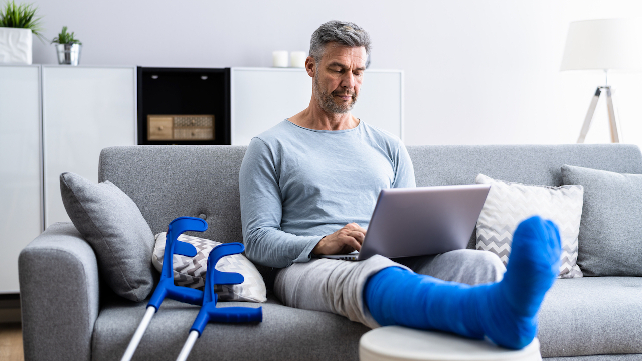 Injured Man With Broken Leg