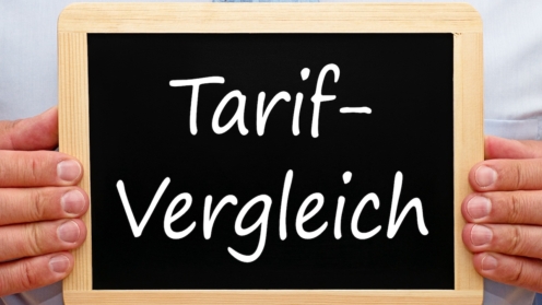 Tarif Vergleich - Mann mit Tafel