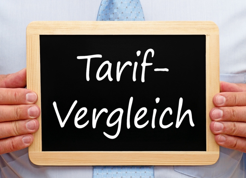 Tarif Vergleich - Mann mit Tafel