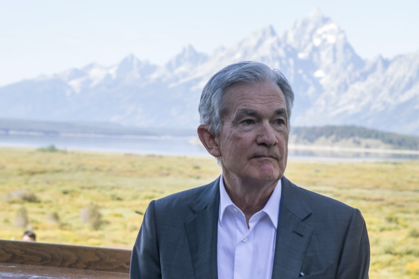Federal Reserve Chairman Jerome Powell takes a break outside of Jackson Lake Lodge during the Jackson Hole Economic Symposium near Moran in Grand Teton National Park, Wyo., Friday, Aug. 25, 2023. (AP Photo/Amber Baesler)
