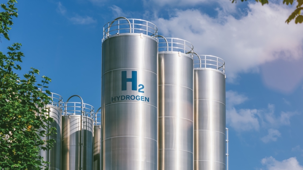 Hydrogen renewable energy production - hydrogen gas for clean electricity solar and windturbine facility.